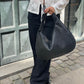 Romy Trendy gevlochten handtas